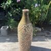 green carved vase