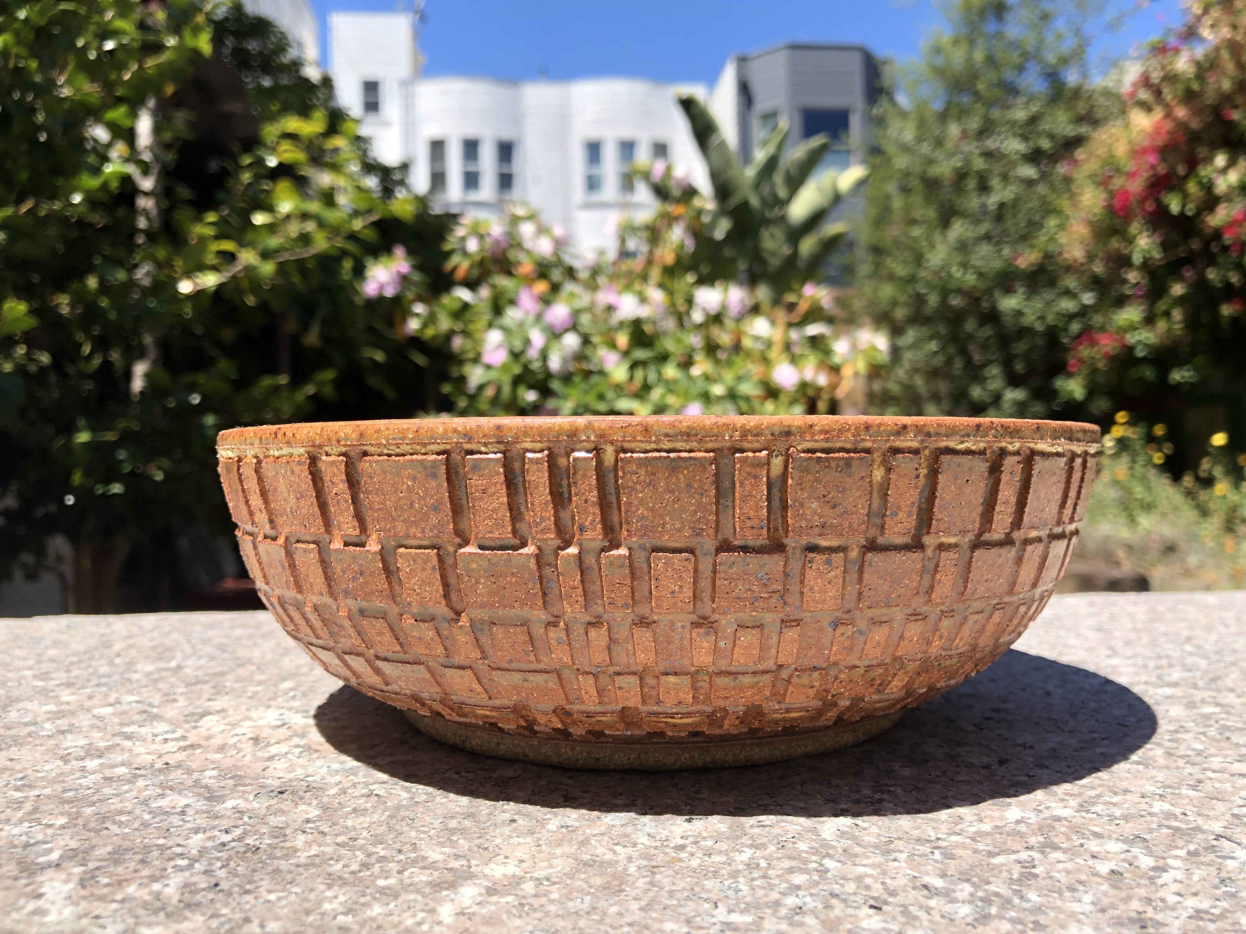 carved brown yellow bowl