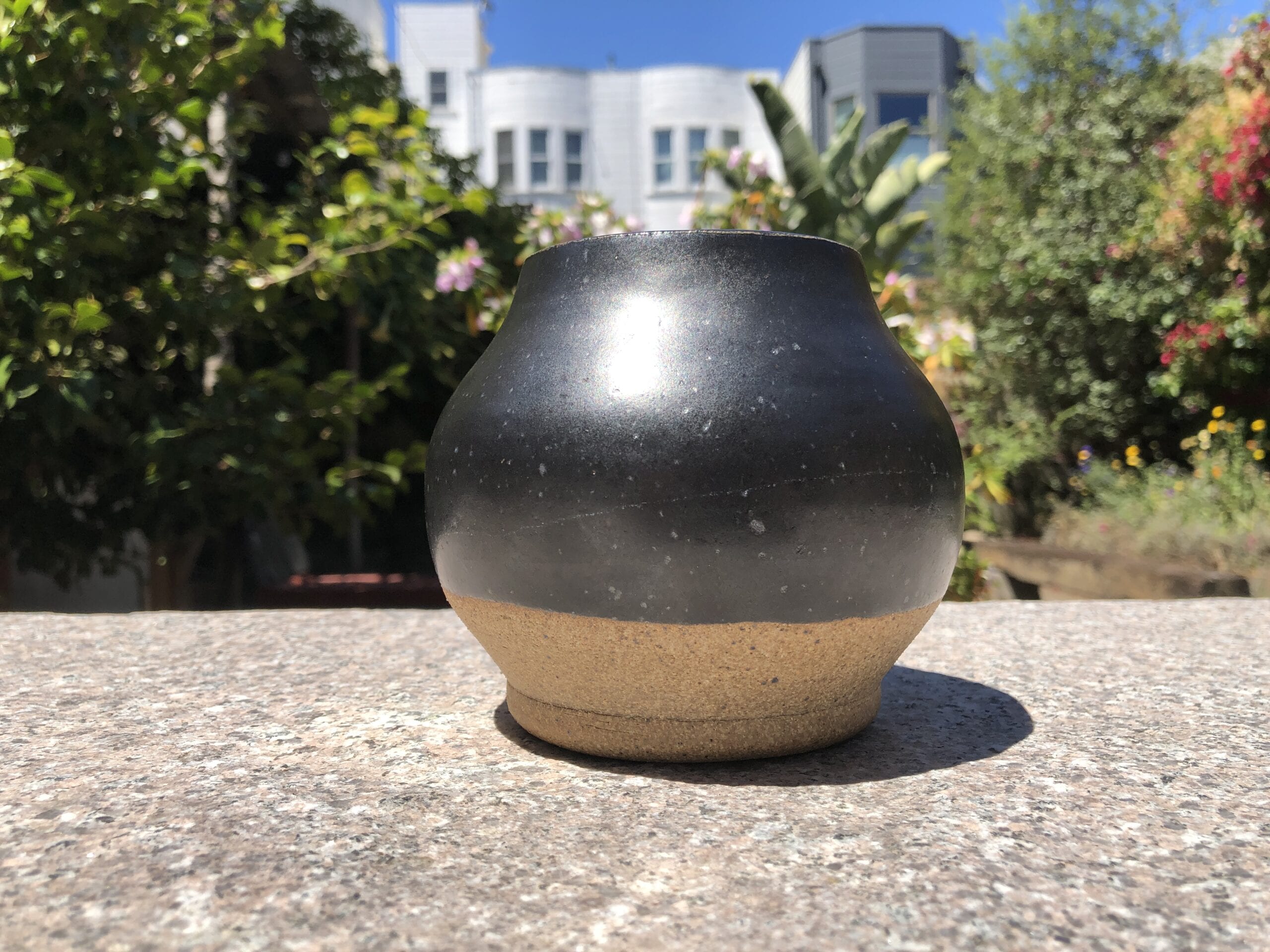 black stoneware jar