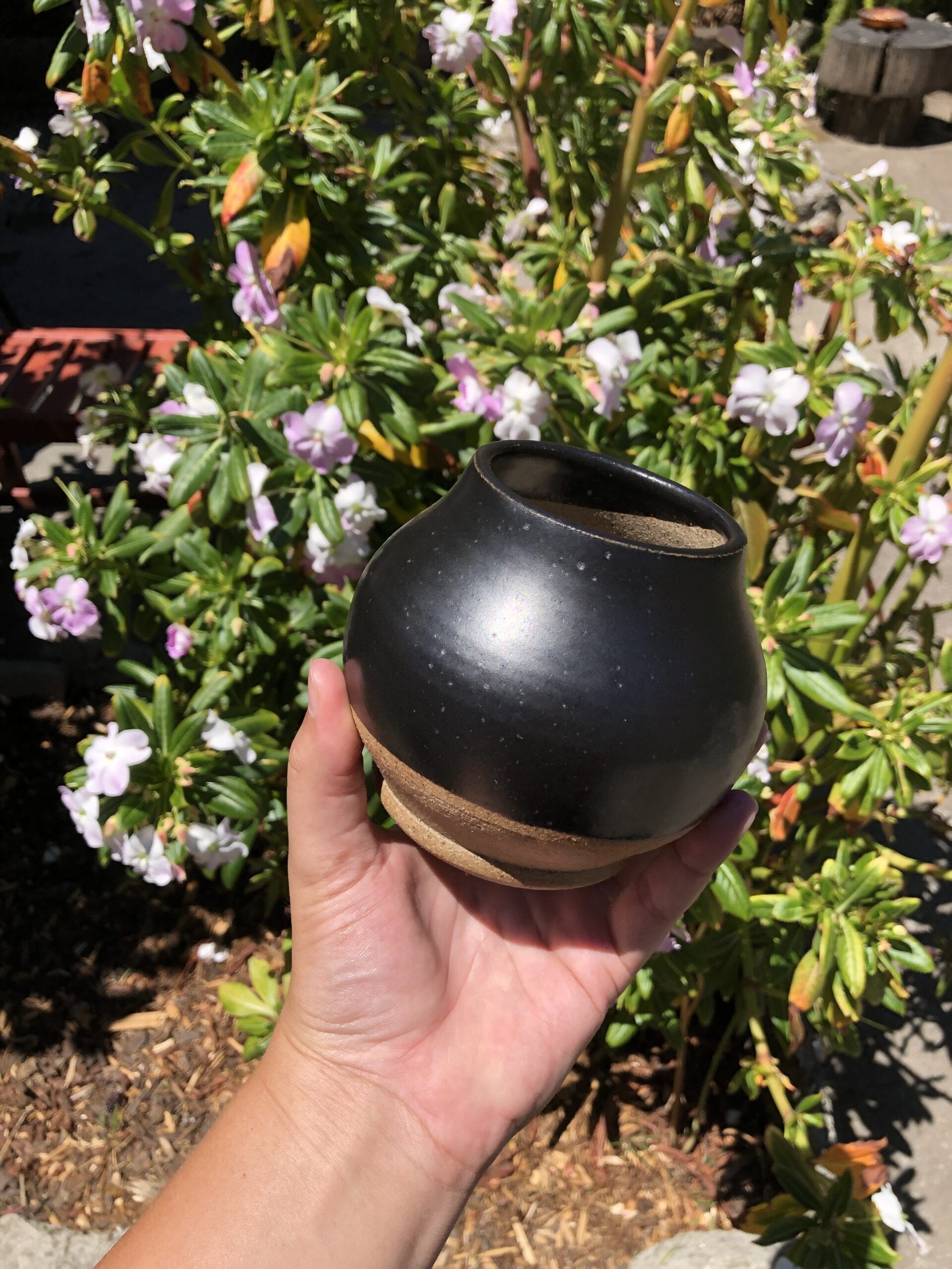 black stoneware jar