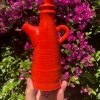 red orange teapot