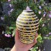 black yellow vase