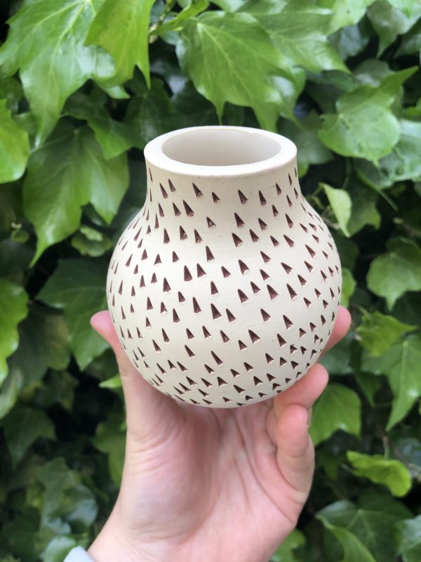 white maroon triangle vase