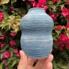 white dark blue vase
