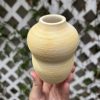 white yellow vase
