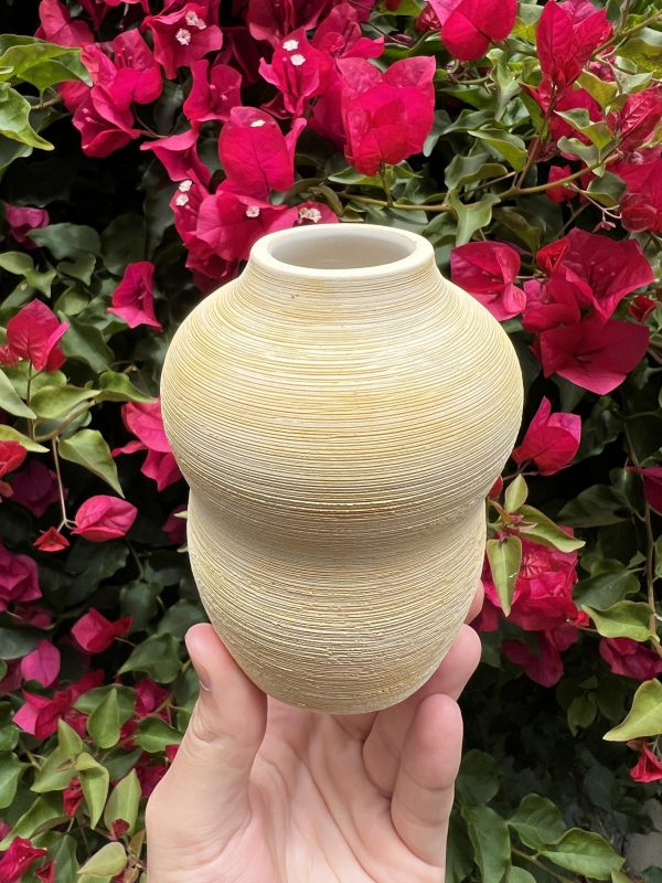 white yellow vase