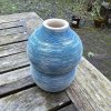 white dark blue bud vase