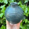 floating blue bud vase