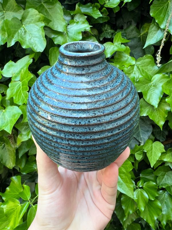 floating blue bud vase