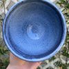 floating blue bowl