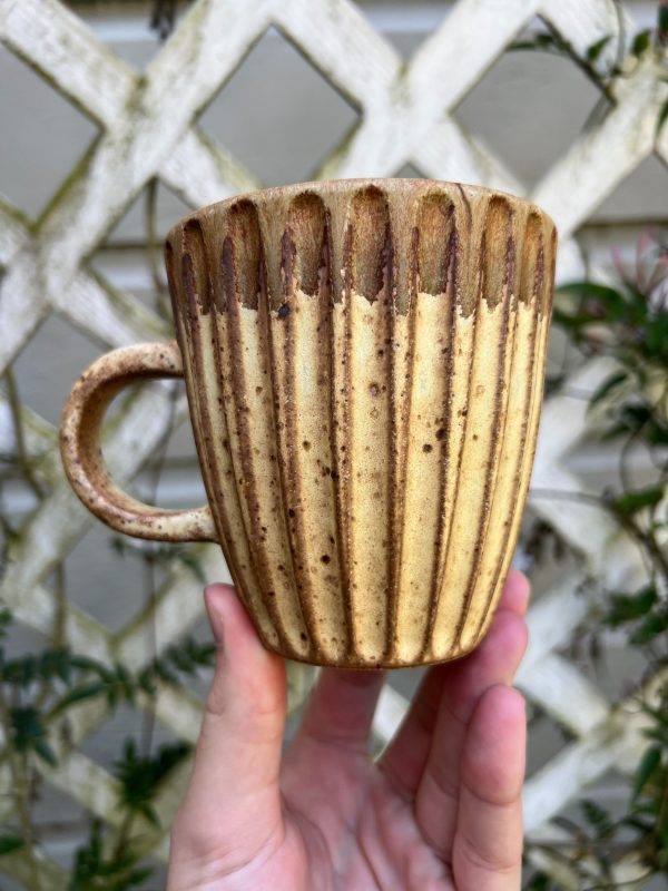 yellow brown mug