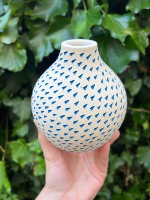 dark blue triangle bud vase