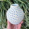 light blue triangle bud vase