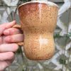 breaking rust mug