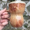 breaking rust mug