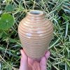 breaking rust bud vase