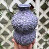 purple carved bud vase