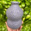 purple carved bud vase