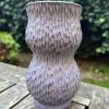 purple carved vase