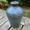 floating blue stripe bud vase