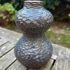 floating blue carved bud vase