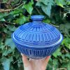 dark blue carved jar