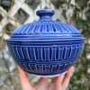 dark blue carved jar