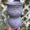 purple carved vase