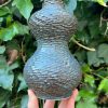 floating blue carved bud vase