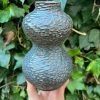 floating blue carved bud vase