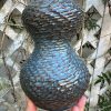 floating blue carved bud vase