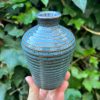 floating blue stripe bud vase