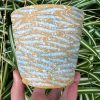 yellow blue white splatter planter