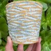 yellow blue white splatter planter