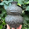 dark floating blue carved bud vase