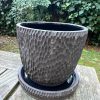 black carved planter