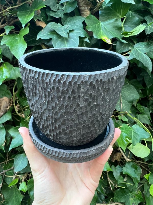 black carved planter