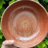 wide orange serving bowl
