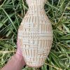 yellow patterned vase