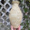 yellow patterned vase