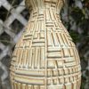 yellow patterned vase