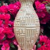 yellow patterned vase
